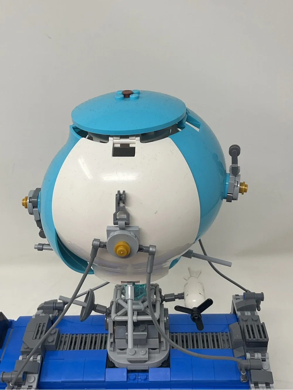 LEGO Blue and White Fortnite Battle Bus with Yellow Accents